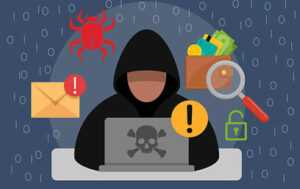 Hooded hacker at a laptop with a skull symbol, surrounded by warning icons like an envelope, lock, magnifying glass, and exclamation marks, signaling cyber threats.